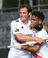 Amsterdam-spelers Burkhardt en D. Cassiem