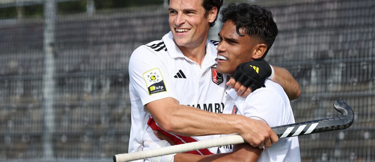Amsterdam-spelers Burkhardt en D. Cassiem